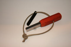 firestarter, flint striker, magnesium and wood. wilderness survival, wilderness preparedness